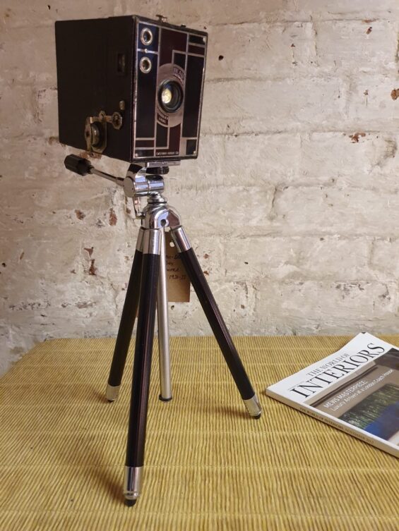 Beau Brownie camera and tripod table lamp lighting