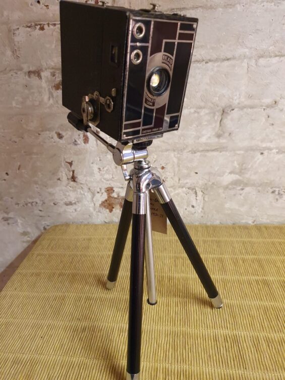 Beau Brownie camera and tripod table lamp lighting