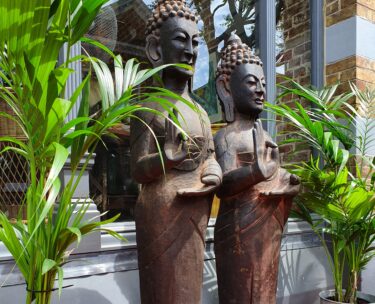 hand carved wooden temple buddhas decorative artefacts garden