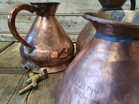 copper ale/water measuring jugs decorative homewares artefacts