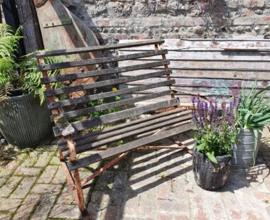 rustic wooden slatted bench with metal frame garden furniture