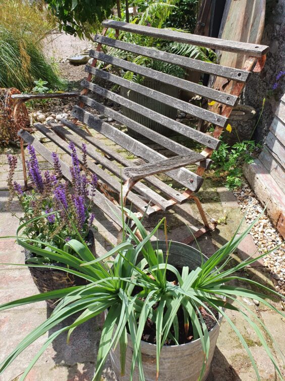rustic wooden slatted bench with metal frame garden furniture
