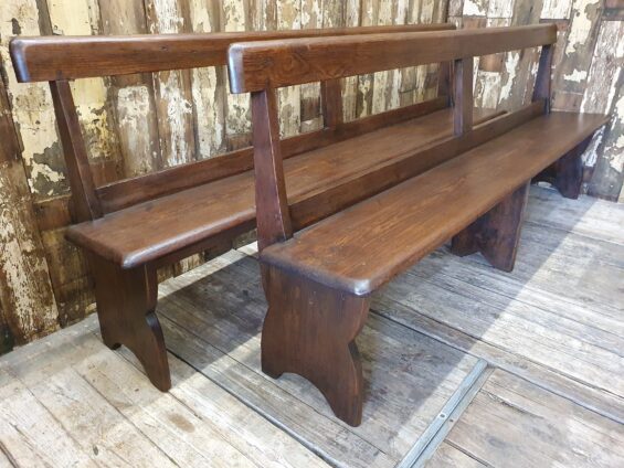 pair of wooden church pews seating occasional chairs