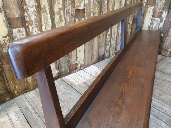 pair of wooden church pews seating occasional chairs