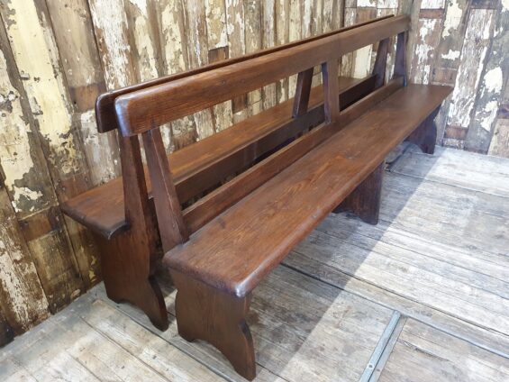 pair of wooden church pews seating occasional chairs