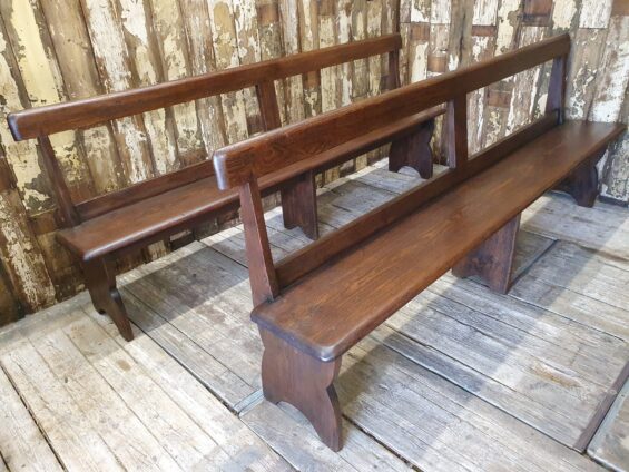 pair of wooden church pews seating occasional chairs