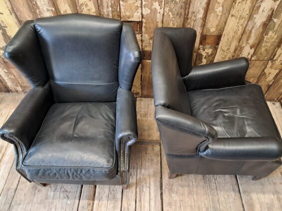 a pair of leather wingback armchairs seating armchairs