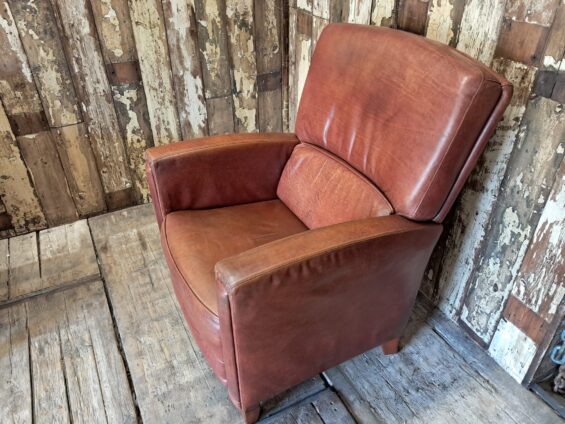 pair of leather club chairs seating armchairs
